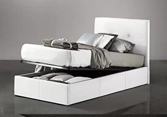 Single bed and a half with storage compartment and pillows on the headboard